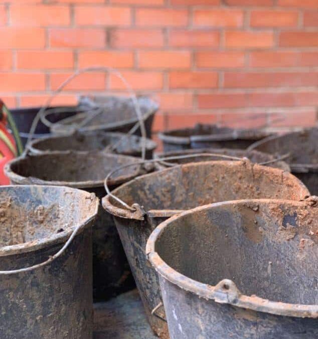 Buckets used for repairing rising damp in Melbourne