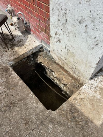 Underpinning Dandenong Team digging a hole to underpin a house in Dandenong